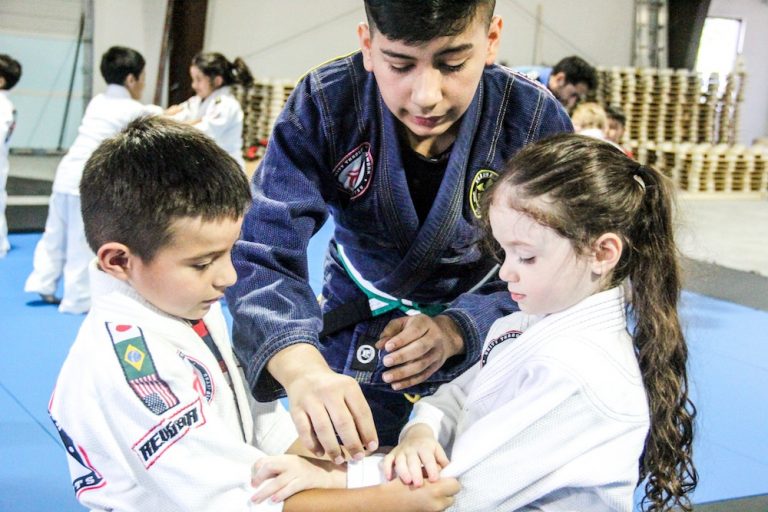 Anthony Martinez teaching kids Brazilian Jiu-Jitsu